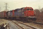 Vehicle train approaches Lang Yard